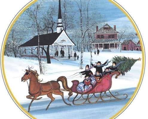 Alleluia porcelain ornament by artist P Buckley Moss features a horse and sleigh with family and Christmas tree in the sleigh. Shades of rust in the horse, cherry red in the sleigh and blues, white and aqua in the background.
