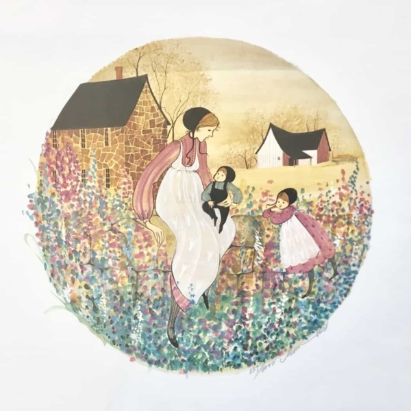 Cottage Wall limited edition print by P Buckley Moss features a mother with two children in a rural setting with barn, house sitting on a wall with a growth of flowers. Colors of blue, green, tan, cream pink and mauve and golden shades of yellow.