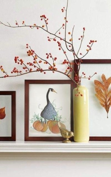 Home decor setting with limited edition print of Moss Halloween Goose. Blue hue to the feathers on the goose with three beautiful large pumpkins at the foreground.