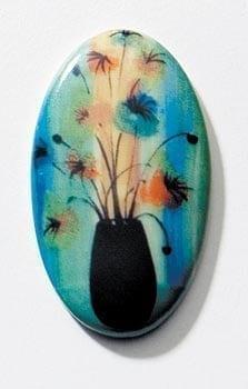 Flower Vase, limited edition magnetic porcelain Jewelry to be worn with a gold colored Jewelry surround. American artist P Buckley Moss. Shades of blue and green with a splash of golden yellow and orange with black stems and vase.