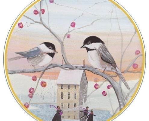Limited edition porcelain ornament by P Buckley Moss featuring two birds on tree branches with berries in a soft background of peach and blue.