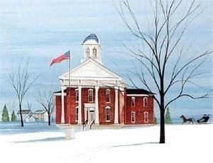County Courthouse signed and numbered limited edition print by American artist P Buckley Moss at Canada Goose Gallery in Waynesville, Ohio. County Courthouse limited edition print by P Buckley Moss features a courthouse in Osage, Iowa. Colors of burgundy red for the building against an aqua sky. Bare iconic Moss tree in the foreground and an American flag flying in front of the courthouse.