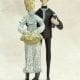 Together Forever porcelain figurine by P Buckley Moss featuring a wedding couple on a base with the woman carrying a basket of flowers, man carrying a bible. Colors of light green and pastel colors with black coat.
