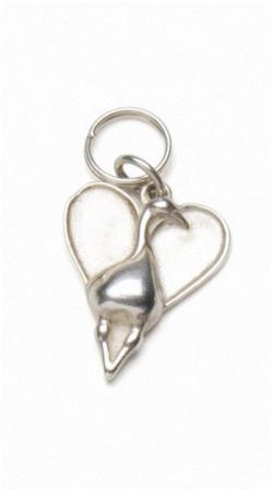 Canada Goose in a heart designed by P Buckley Moss. Sterling silver to be worn on a chain or bracelet.