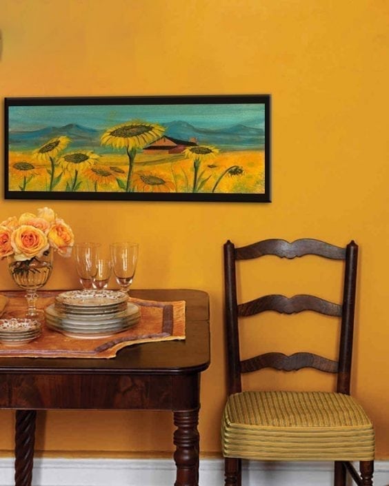 Home decor hallway with Fields of Sunshine limited edition print by P Buckley Moss in shades of marigold colors.