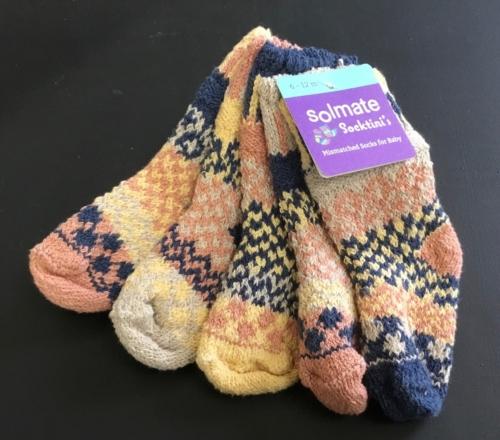 Solmate Pearl Baby Socks in navy, yellow, cream and light rose.