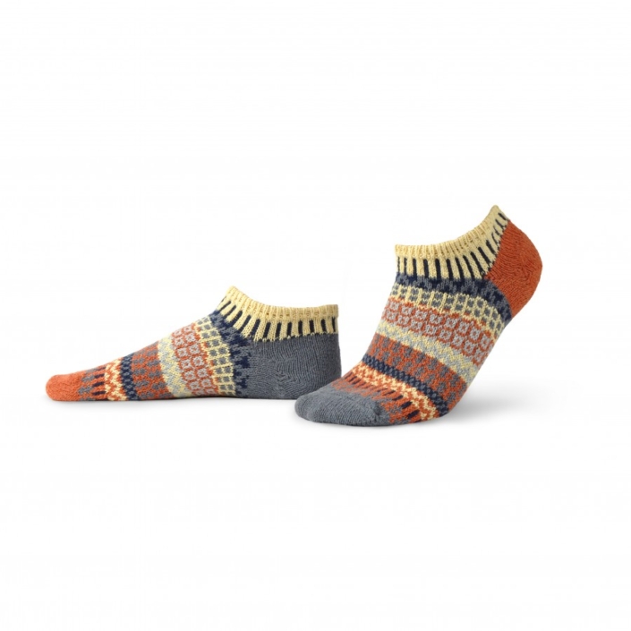 Solmate Nutmeg Ankle sock in colors of creamy yellow, rustic orange, navy, blue-gray, periwinkle.