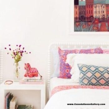 City Blossoms limited edition prints by P Buckley Moss features an entire line of row houses in vibrant colors of reds