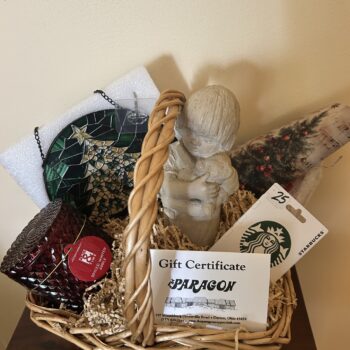 #9 Christmas Basket with Paragon Restaurant and Starbucks gift cards, vintage child and teddy bear sculpture, Christmas tree glass decoration and candle.