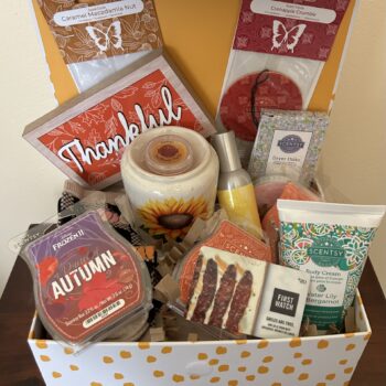 #7 Scentsy Basket with fall home fragrances, sunflower ceramic, body cream, soaps, Thankful sign, pumpkin accessories and First Watch gift card.