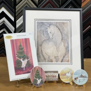Basket #2 Canada Goose Gallery fundraiser prize with framed P. Buckley Moss Spirit 1 print, signed Nutcracker print, three ornaments and gift card.